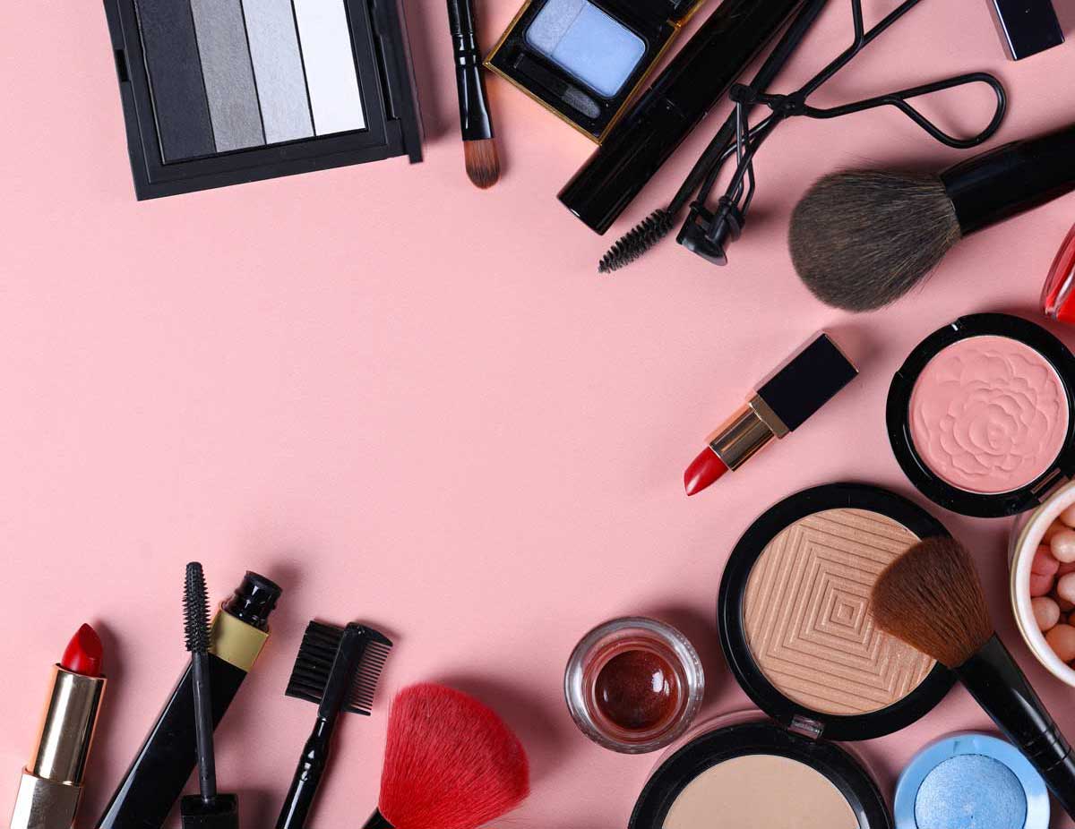 assortment of cosmetics for makeup lipstick powder eye shadow